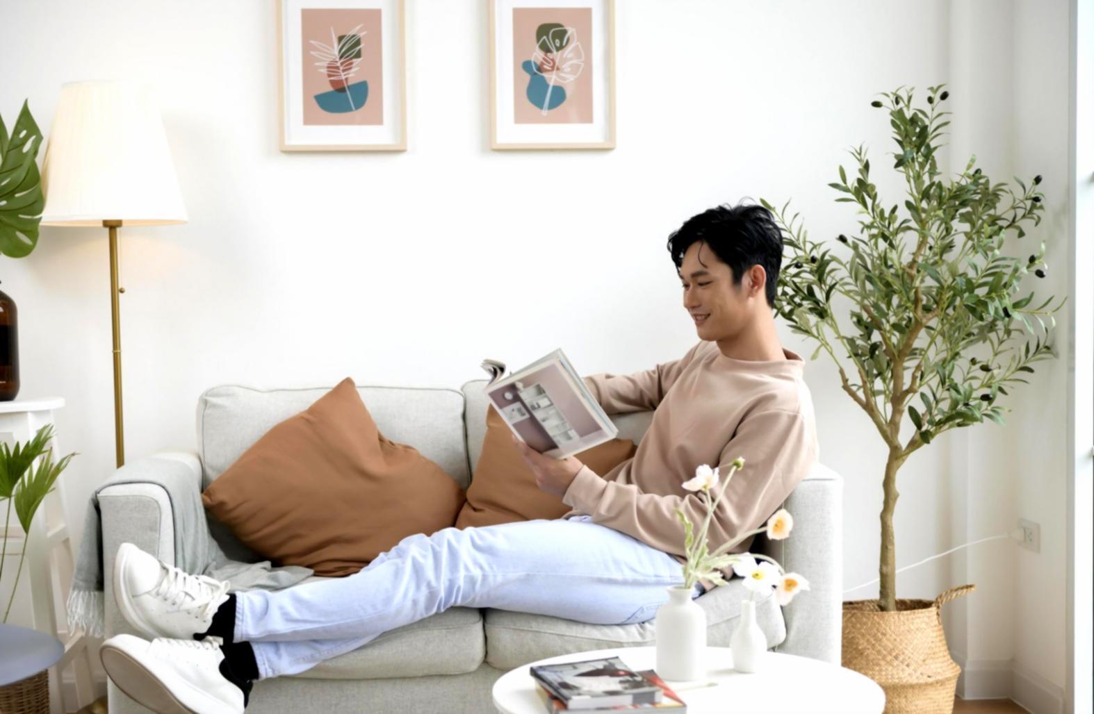 Workshop participant reviewing budget tracking methods on laptop